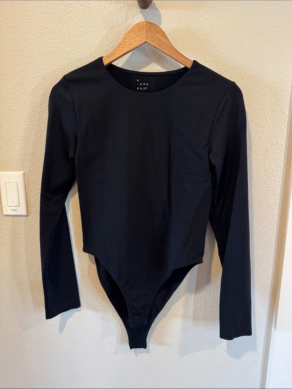 a new day Black Long-Sleeve Crewneck Bodysuit with Snap Closure